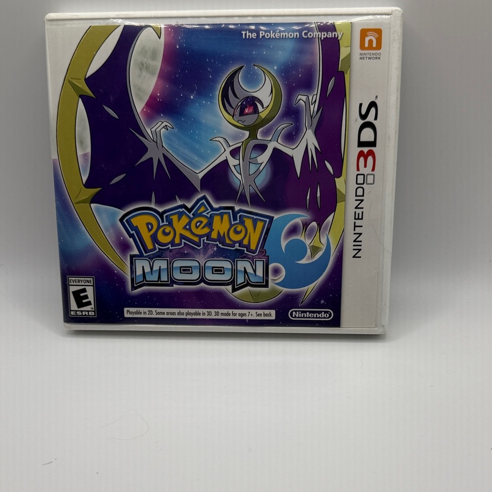 Nintendo 3DS Pokémon Moon - Black, Purple, and White